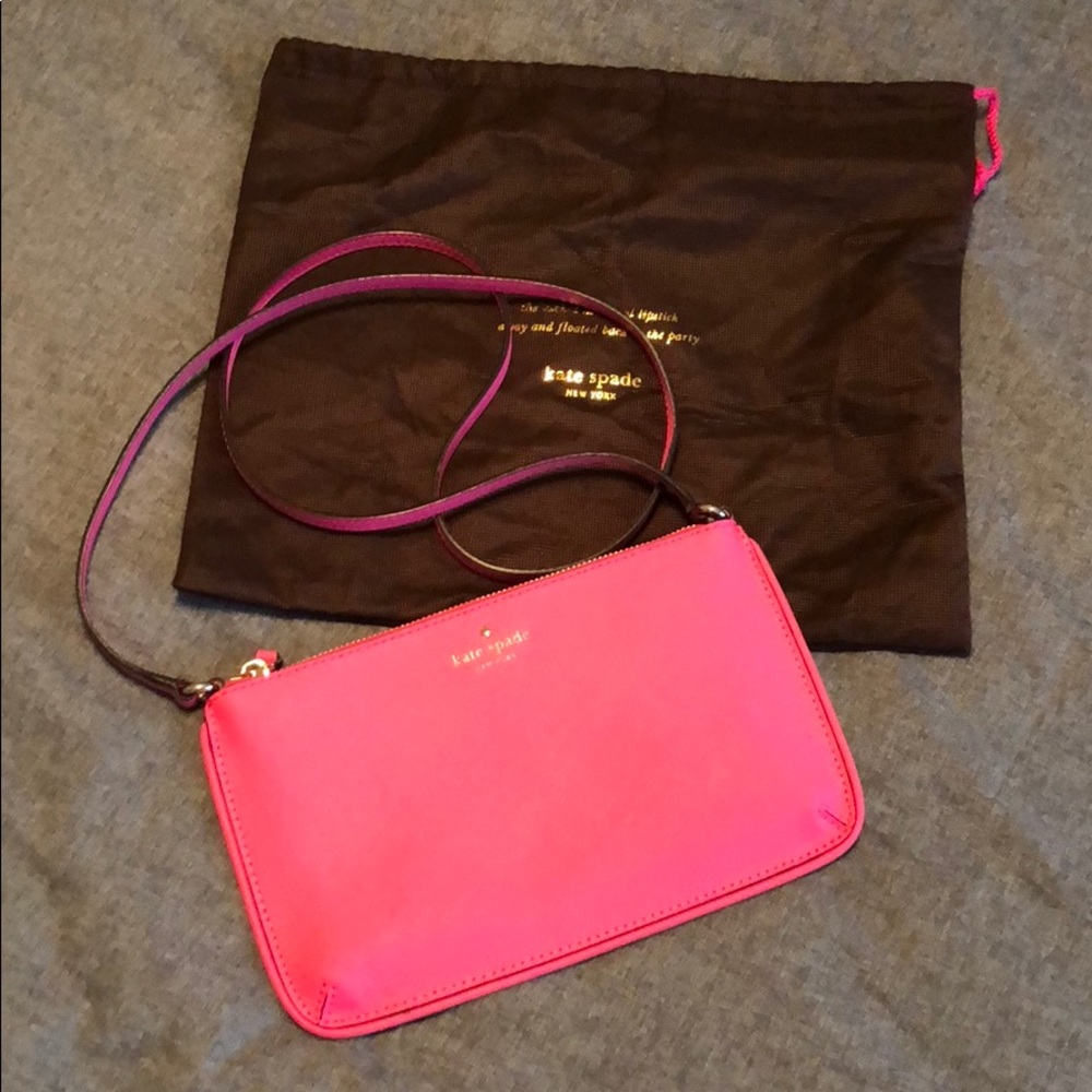 Hot pink Kate Spade crossbody with dust bag.